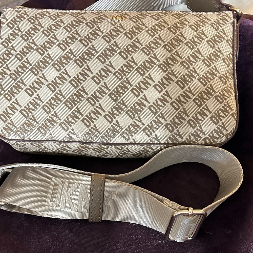 NWT DKNY cross body with monogram over entire bag. Bryant Park Demi MSRP $ 148